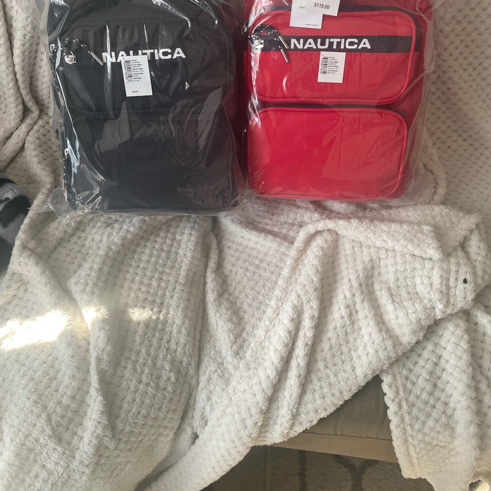I have a few nautica bags the blue ones are larger the black one is smaller